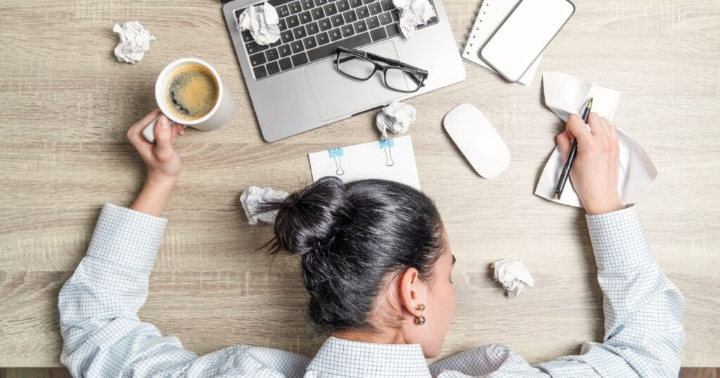 Lady sleeping at desk business life