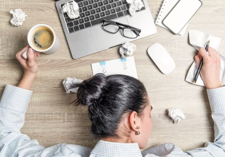 Lady sleeping at desk business life